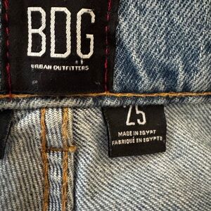 BDG  ripped Distressed Stretch high rise slim straight blue jeans 
Size 25